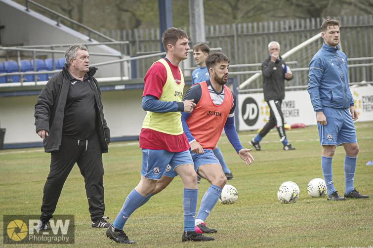 New Assistant manager Gary Richards oversees the warm-up